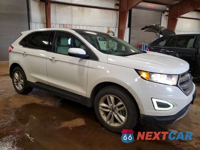 Czwarte zdjęcie samochodu z boku: 2015 FORD EDGE SEL VIN:2FMTK4J97FBC36210 - miniatura