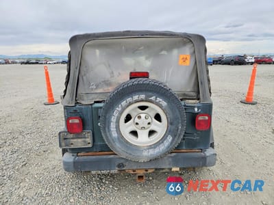 Zdjęcie 6 z 13 samochodu: 2004 JEEP WRANGLER / TJ SPORT VIN:1J4FA49S64P747788 - miniatura