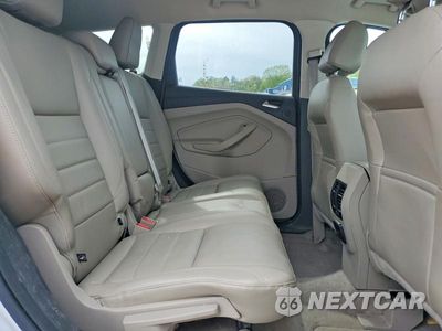 Zdjęcie 11 z 13 samochodu: 2014 FORD ESCAPE TITANIUM VIN:1FMCU0JX1EUD36393 - miniatura