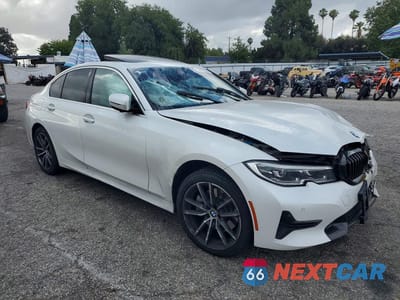 Czwarte zdjęcie samochodu z boku: 2021 BMW 330I VIN:3MW5R1J07M8B49904 - miniatura