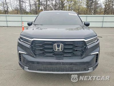 Piąte zdjęcie samochodu w środku: 2025 HONDA PILOT TOURING VIN:5FNYG1H7XSB119135 - miniatura
