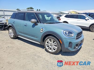 Czwarte zdjęcie samochodu z boku: 2023 MINI COOPER S E COUNTRYMAN ALL4 VIN:WMZ23BS03P3R44683 - miniatura