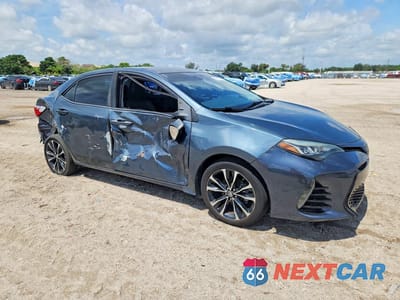 Czwarte zdjęcie samochodu z boku: 2018 TOYOTA COROLLA SE VIN:5YFBURHE6JP821676 - miniatura