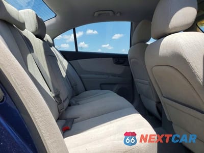 Zdjęcie 10 z 12 samochodu: 2006 KIA OPTIMA LX VIN:KNAGE123865074210 - miniatura
