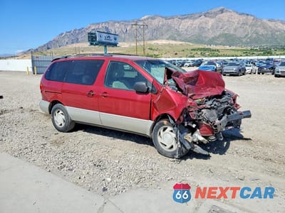 Czwarte zdjęcie samochodu z boku: 1999 TOYOTA SIENNA XLE VIN:4T3ZF13C3XU132905 - miniatura
