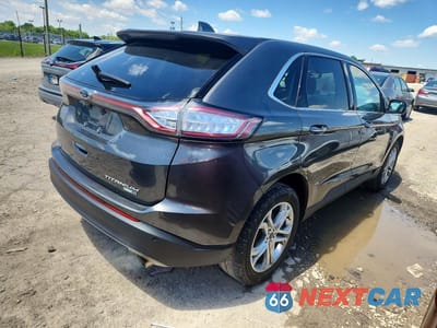 Trzecie zdjęcie samochodu z tyłu: 2018 FORD EDGE TITANIUM VIN:2FMPK4K95JBB43324 - miniatura