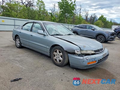 Czwarte zdjęcie samochodu z boku: 1995 HONDA ACCORD EX VIN:1HGCE6666SA024380 - miniatura