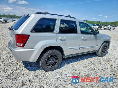 Trzecie zdjęcie samochodu z tyłu: 2010 JEEP GRAND CHEROKEE LAREDO VIN:1J4PS4GK4AC131465 - miniatura