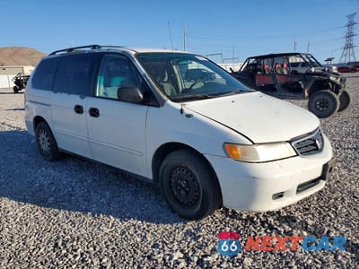 Czwarte zdjęcie samochodu z boku: 2002 HONDA ODYSSEY LX VIN:5FNRL18592B048041 - miniatura