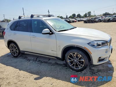 Czwarte zdjęcie samochodu z boku: 2018 BMW X5 XDR40E VIN:5UXKT0C58J0W00675 - miniatura