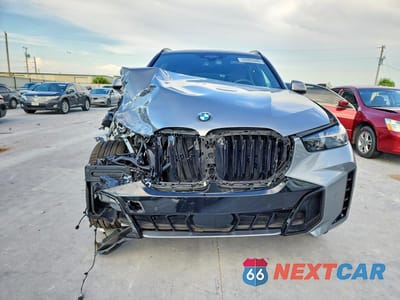 Piąte zdjęcie samochodu w środku: 2025 BMW X5 XDRIVE40I VIN:5UX23EU01S9Z65552 - miniatura