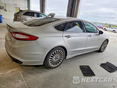 Trzecie zdjęcie samochodu z tyłu: 2016 FORD FUSION TITANIUM VIN:3FA6P0K93GR216863 - miniatura