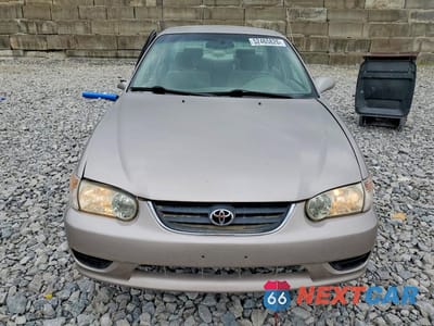 Piąte zdjęcie samochodu w środku: 2002 TOYOTA COROLLA LE VIN:2T1BR12E72C562323 - miniatura