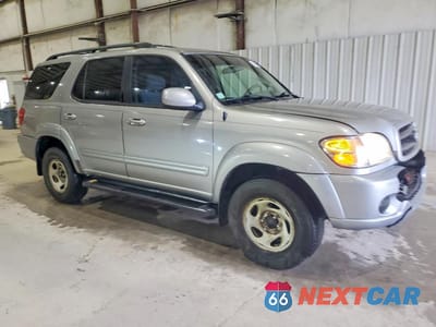 Czwarte zdjęcie samochodu z boku: 2004 TOYOTA SEQUOIA SR5 VIN:5TDBT44A74S217266 - miniatura
