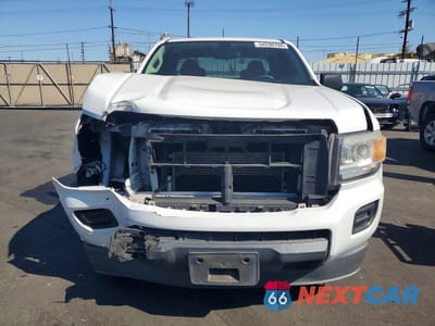 Piąte zdjęcie samochodu w środku: 2015 GMC CANYON VIN:1GTH5AE30F1211277 - miniatura