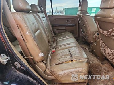 Zdjęcie 11 z 13 samochodu: 2004 HONDA PILOT VIN:5FNYF18554B002969 - miniatura