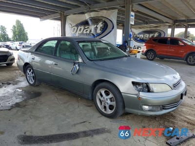 Czwarte zdjęcie samochodu z boku: 2000 LEXUS ES 300 VIN:JT8BF28GXY5102701 - miniatura