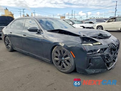 Czwarte zdjęcie samochodu z boku: 2023 BMW 740 I VIN:WBA23EH08PCN49355 - miniatura