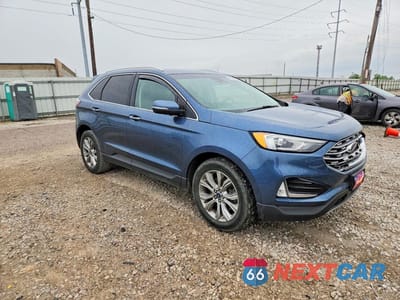 Czwarte zdjęcie samochodu z boku: 2019 FORD EDGE TITANIUM VIN:2FMPK4K99KBC70126 - miniatura