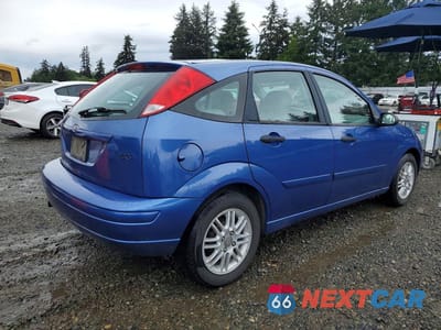 Trzecie zdjęcie samochodu z tyłu: 2004 FORD FOCUS ZX5 VIN:3FAFP37304R112400 - miniatura