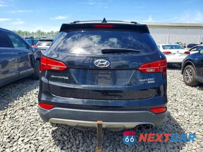 Zdjęcie 6 z 13 samochodu: 2013 HYUNDAI SANTA FE SPORT 2.0T VIN:5XYZUDLA4DG034207 - miniatura