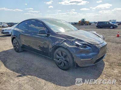 Czwarte zdjęcie samochodu z boku: 2024 TESLA MODEL Y VIN:7SAYGDEE4RA294317 - miniatura