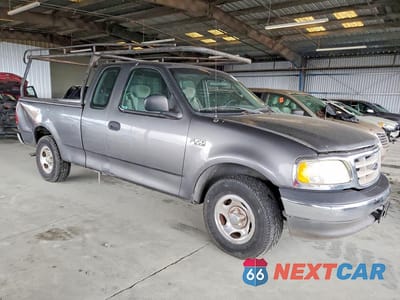 Czwarte zdjęcie samochodu z boku: 2003 FORD F150 VIN:1FTRX17283NA84804 - miniatura