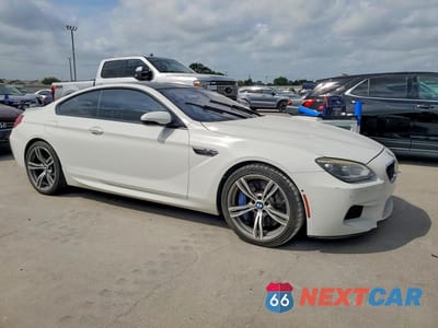 Czwarte zdjęcie samochodu z boku: 2014 BMW M6 VIN:WBSLX9C58ED160219 - miniatura