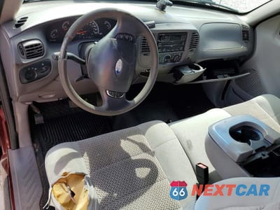 Zdjęcie 8 z 12 samochodu: 2003 FORD F150 VIN:1FTRX172X3NA44563 - miniatura