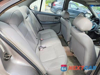 Zdjęcie 10 z 13 samochodu: 1999 NISSAN ALTIMA XE VIN:1N4DL01D6XC260718 - miniatura