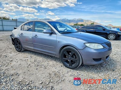 Czwarte zdjęcie samochodu z boku: 2006 MAZDA 3 I VIN:JM1BK12F561442687 - miniatura