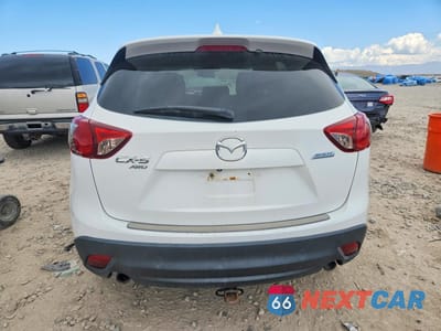 Zdjęcie 6 z 13 samochodu: 2013 MAZDA CX-5 TOURING VIN:JM3KE4CE0D0132651 - miniatura