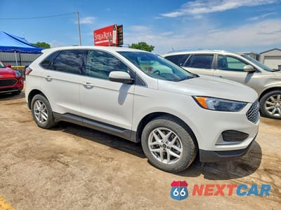 Czwarte zdjęcie samochodu z boku: 2023 FORD EDGE SEL VIN:2FMPK4J9XPBA11783 - miniatura