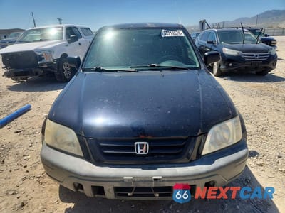 Piąte zdjęcie samochodu w środku: 1999 HONDA CR-V LX VIN:JHLRD1845XC016425 - miniatura