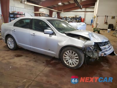 Czwarte zdjęcie samochodu z boku: 2012 FORD FUSION HYBRID VIN:3FADP0L34CR351054 - miniatura
