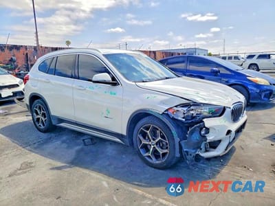 Czwarte zdjęcie samochodu z boku: 2018 BMW X1 XDRIVE28I VIN:WBXHT3C31J5K29697 - miniatura
