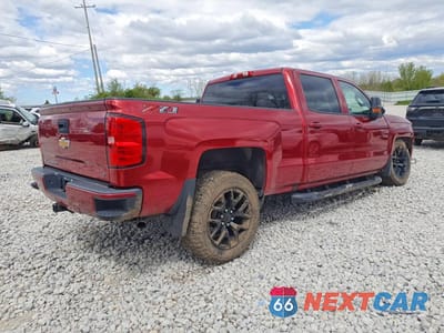 Trzecie zdjęcie samochodu z tyłu: 2018 CHEVROLET SILVERADO K1500 LT VIN:3GCUKREC1JG425680 - miniatura