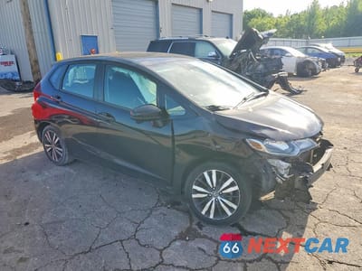 Czwarte zdjęcie samochodu z boku: 2015 HONDA FIT EX VIN:3HGGK5G86FM765321 - miniatura