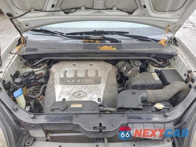 Zdjęcie 12 z 13 samochodu: 2005 HYUNDAI TUCSON VIN:KM8JN12DX5U200875 - miniatura
