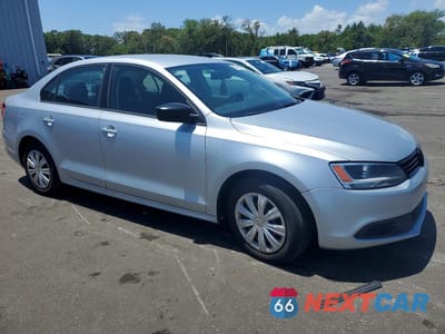 Czwarte zdjęcie samochodu z boku: 2014 VOLKSWAGEN JETTA BASE VIN:3VW2K7AJXEM327624 - miniatura
