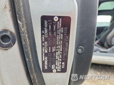 Zdjęcie 12 z 12 samochodu: 2003 HYUNDAI TIBURON GT VIN:KMHHN65F23U014608 - miniatura