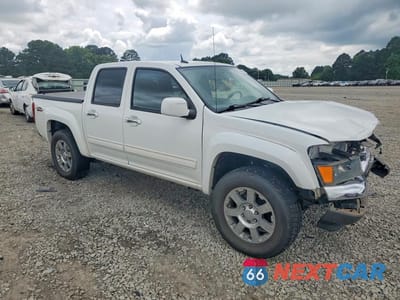 Czwarte zdjęcie samochodu z boku: 2012 GMC CANYON SLE-2 VIN:1GTH6PFE5C8159888 - miniatura