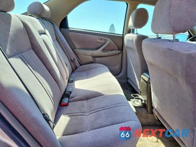 Zdjęcie 10 z 12 samochodu: 1999 TOYOTA CAMRY LE VIN:JT2BG22K3X0360400 - miniatura