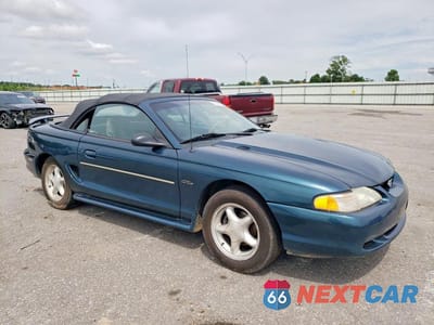 Czwarte zdjęcie samochodu z boku: 1996 FORD MUSTANG GT VIN:1FALP45X7TF133576 - miniatura