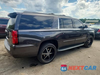 Trzecie zdjęcie samochodu z tyłu: 2016 CHEVROLET SUBURBAN C1500 LT VIN:1GNSCHKC7GR479066 - miniatura