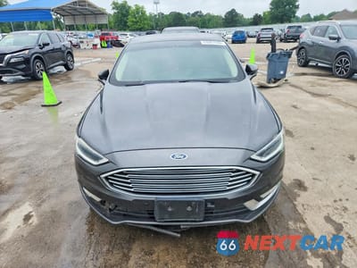 Piąte zdjęcie samochodu w środku: 2017 FORD FUSION HYBRID TITAN VIN:3FA6P0RU9HR399858 - miniatura