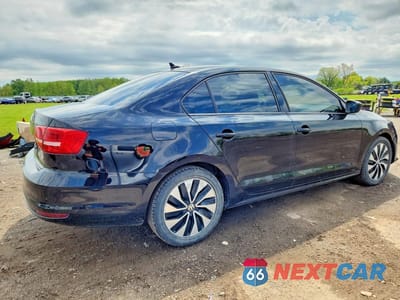 Trzecie zdjęcie samochodu z tyłu: 2015 VOLKSWAGEN JETTA TDI VIN:3VWLA7AJ7FM328335 - miniatura