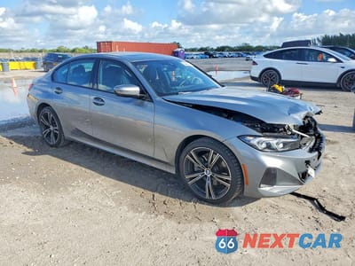 Czwarte zdjęcie samochodu z boku: 2023 BMW 330XI VIN:3MW89FF02P8D04365 - miniatura