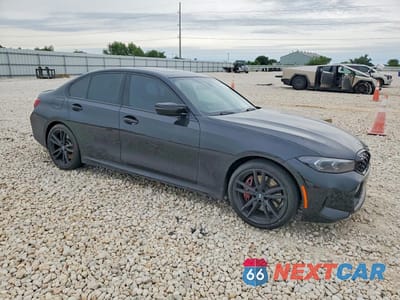 Czwarte zdjęcie samochodu z boku: 2023 BMW M340XI VIN:3MW49FF09P8C96375 - miniatura