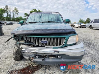 Piąte zdjęcie samochodu w środku: 2000 FORD F150 VIN:2FTRX07L5YCA56524 - miniatura